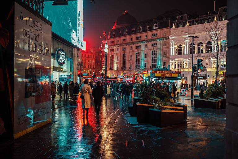 blurred raining busy street